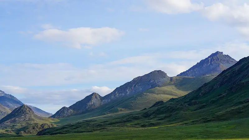 Illustrative photo: Rugged mountains above a wide valley in the Arctic Refuge