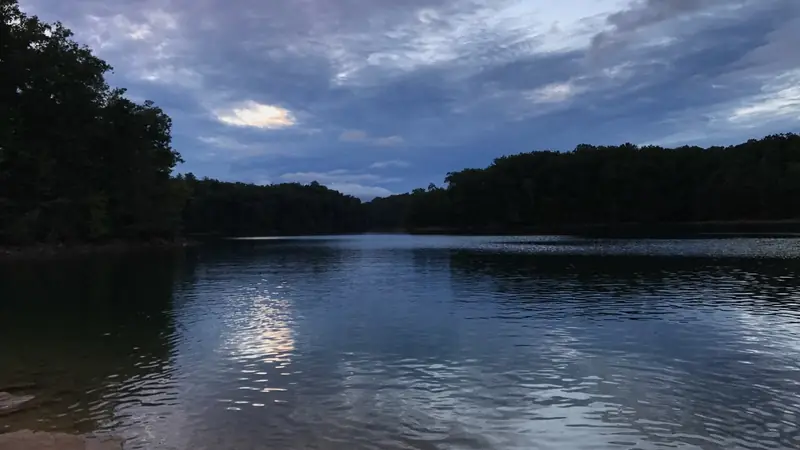 Illustrative photo: Laurel River Lake at dusk under a cloudy sky